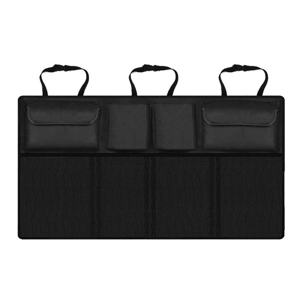 Black foldable car back seat storage bag on a seat, organizing toys and tools in a vehicle interior.