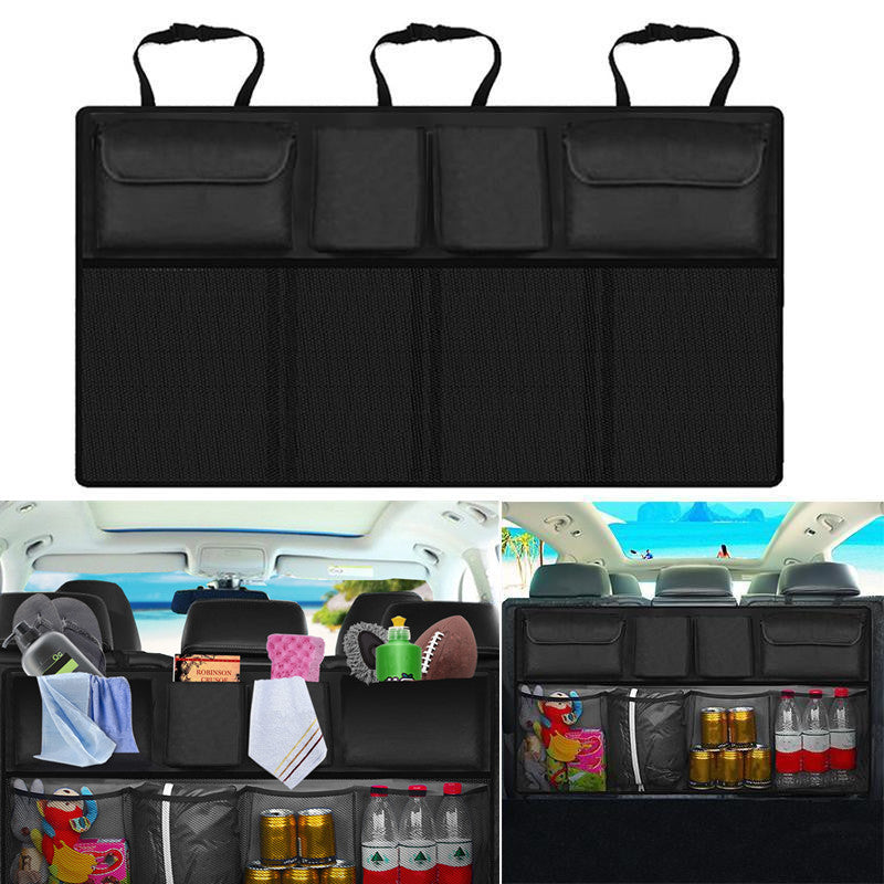 Black foldable car back seat storage bag on a seat, organizing toys and tools in a vehicle interior.
