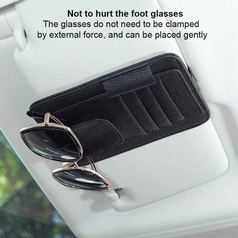 Black PU leather car sun visor storage bag holding sunglasses in a vehicle, organizing essentials in Philadelphia, PA.