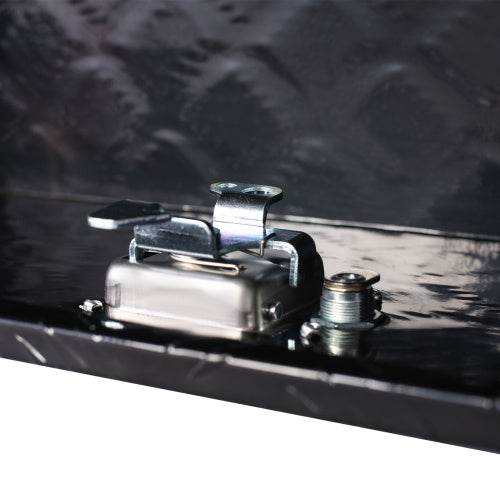 Black 39inch aluminum truck bed tool box on a pickup, offering secure storage outdoors